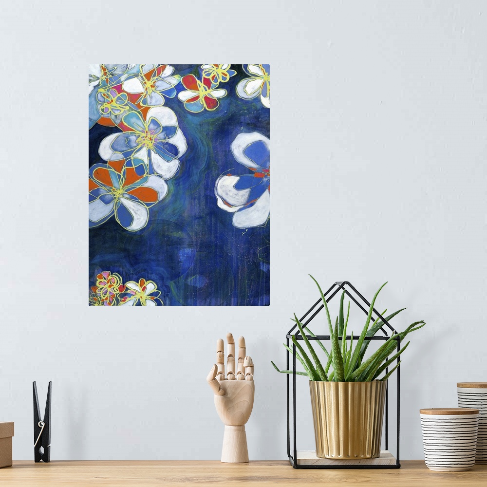 A bohemian room featuring Contemporary abstract painting of organic shapes in various muted colors against a deep blue back...