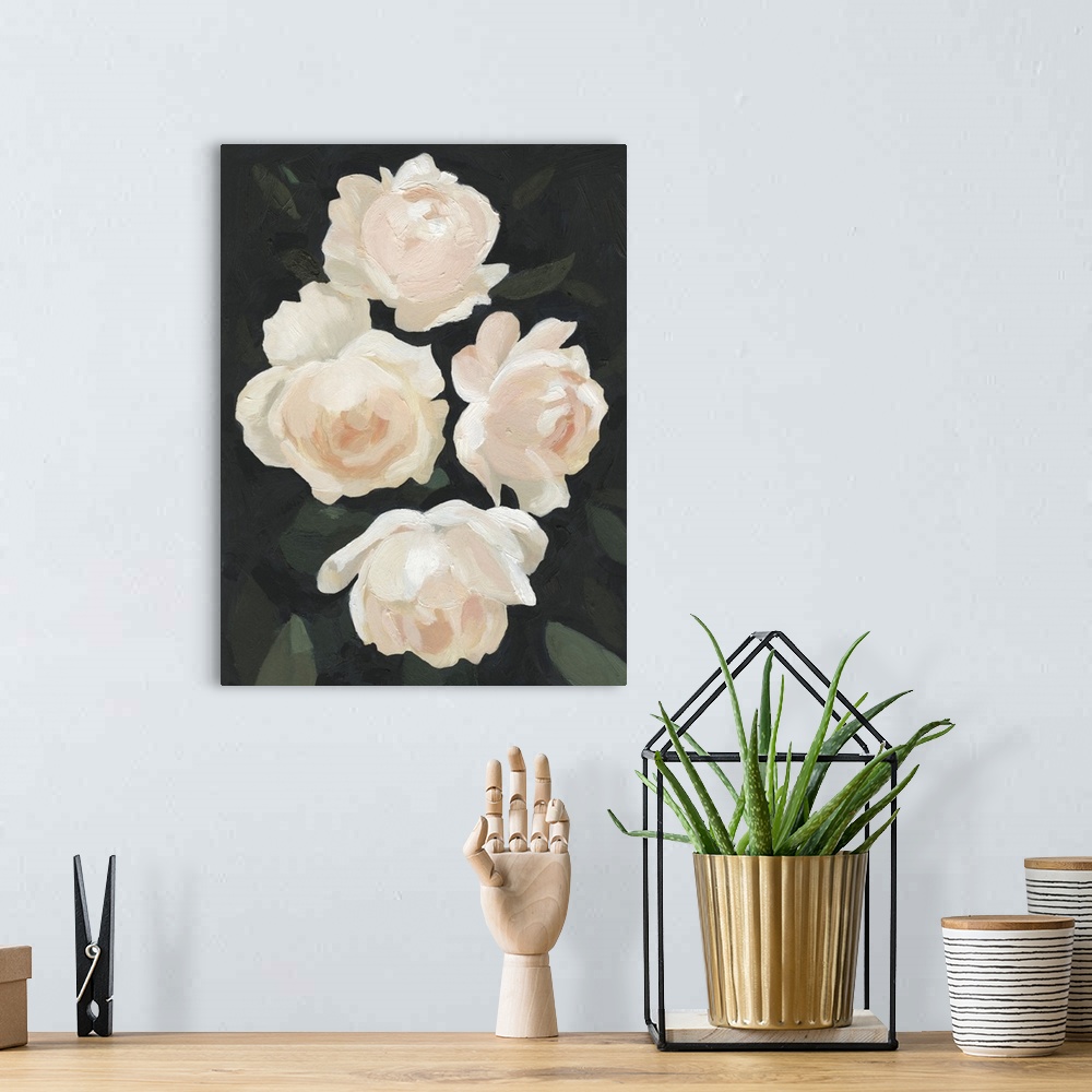 A bohemian room featuring Vertical painting of blush and white blooming flowers against dark green leaves.