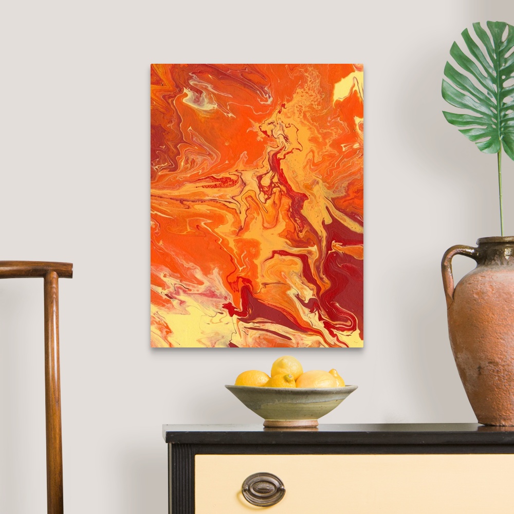 A traditional room featuring Abstract artwork of yellow, orange and red shades in a liquid marble effect.