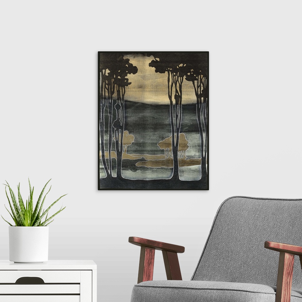 A modern room featuring Art nouveau stylized artwork of a silhouetted trees against a hazy looking background.