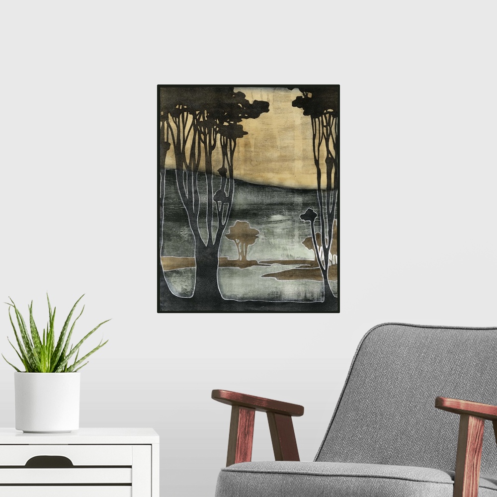 A modern room featuring Art nouveau stylized artwork of a silhouetted trees against a hazy looking background.