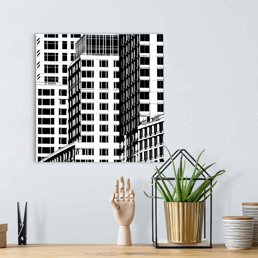 A bohemian room featuring Bold lines and geometric shapes reveal the details of everyday buildings in this cityscape.