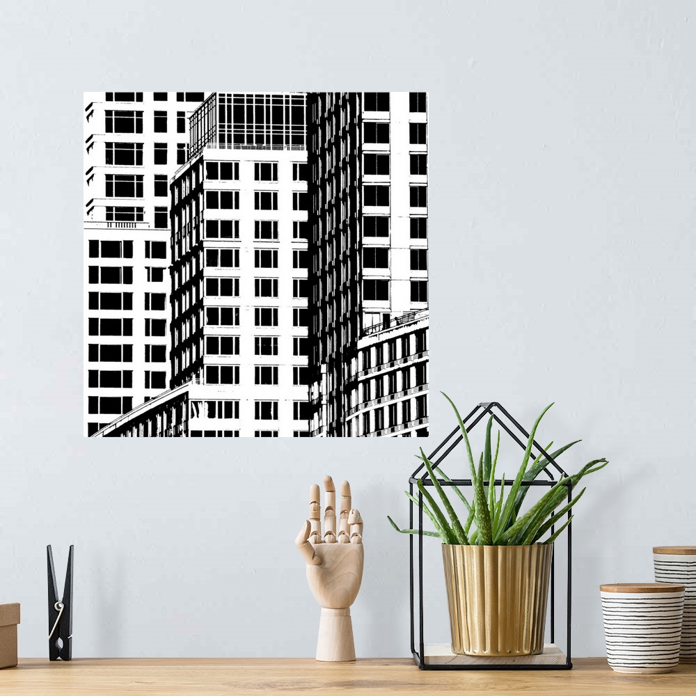 A bohemian room featuring Bold lines and geometric shapes reveal the details of everyday buildings in this cityscape.