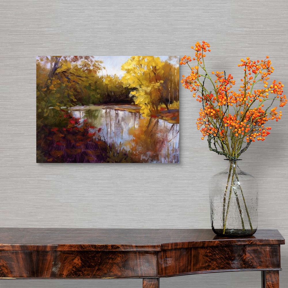 A traditional room featuring Contemporary painting of a river through a fall forest landscape.