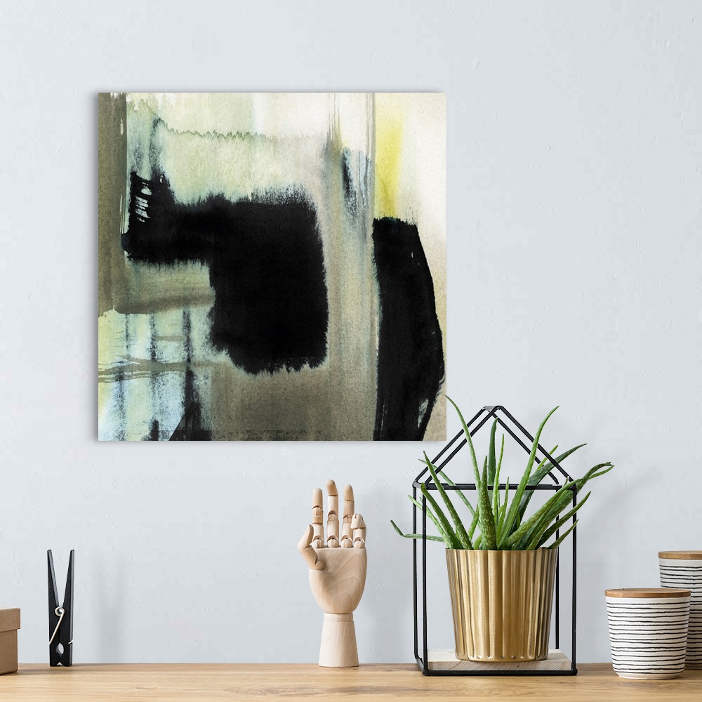 A bohemian room featuring Abstract contemporary artwork in contrasting shades of black and pale blue and yellow.