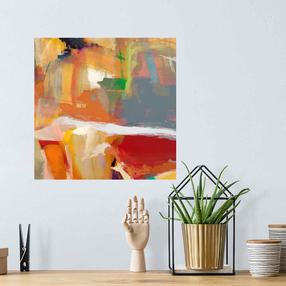 A bohemian room featuring Abstract painting using warm tones.