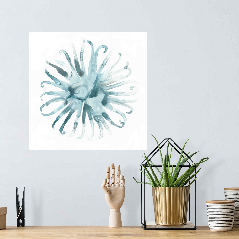 A bohemian room featuring Decorative watercolor painting of sea urchin in shades of blue on a white backdrop.