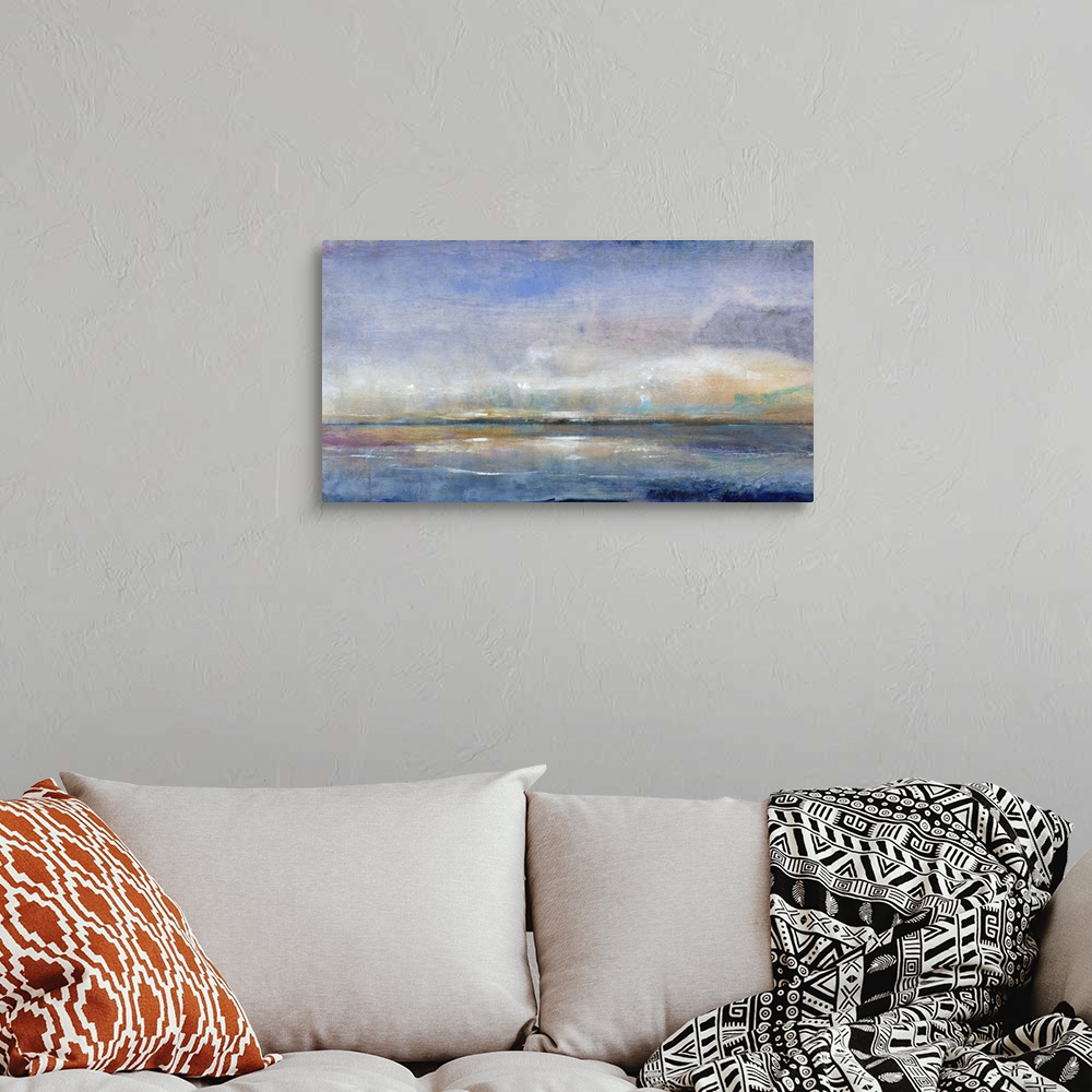 A bohemian room featuring Contemporary painting using blue tones to create a seascape.