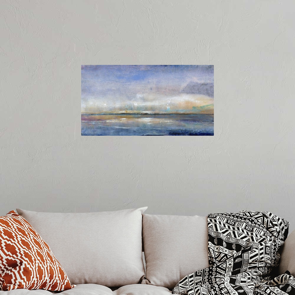 A bohemian room featuring Contemporary painting using blue tones to create a seascape.