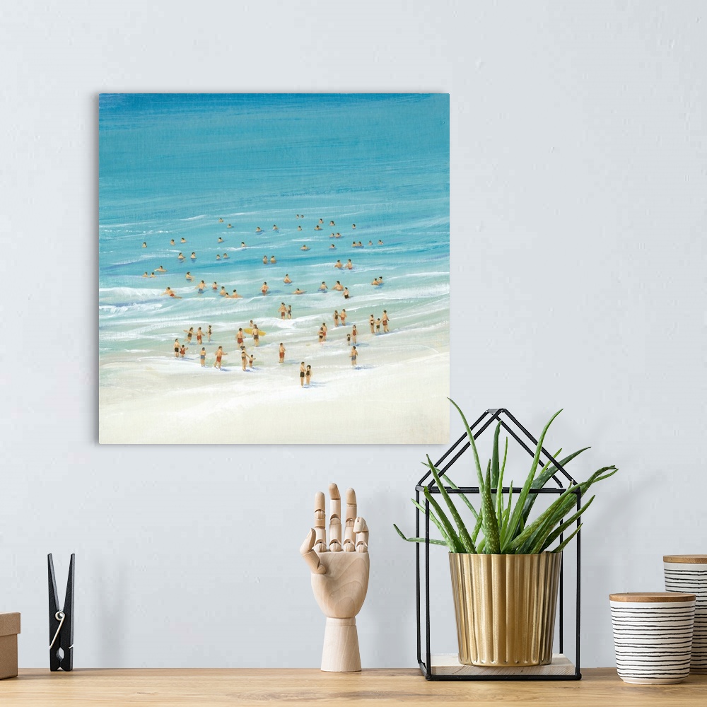 A bohemian room featuring Painting of an aerial view of several beachgoers playing in the ocean.