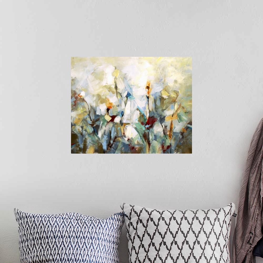 A bohemian room featuring Impressionist style artwork of flowers in bloom.