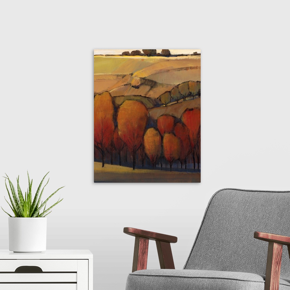 A modern room featuring Contemporary painting in warm tones of a rural landscape in autumn.