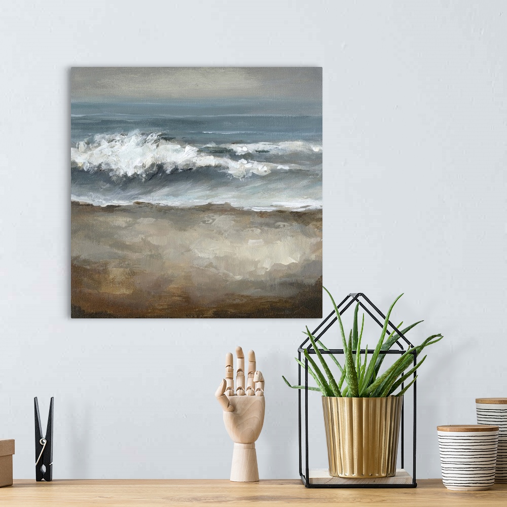 A bohemian room featuring Painting of ocean waves crashing onto beach under a dark sky.