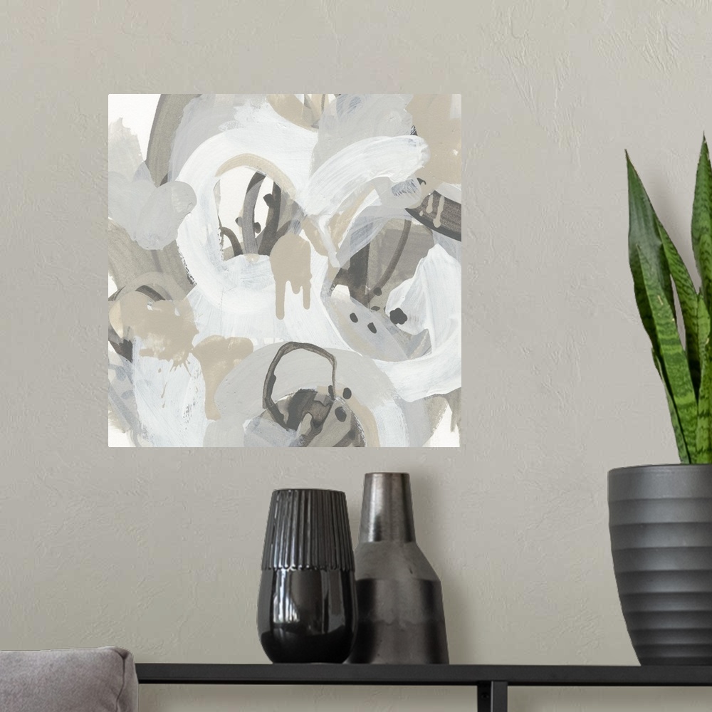 A modern room featuring Contemporary artwork in brown and white tones featuring drips and circular brush strokes.
