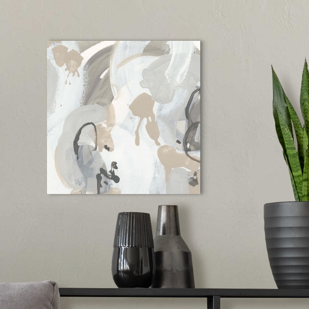 A modern room featuring Contemporary artwork in brown and white tones featuring drips and circular brush strokes.