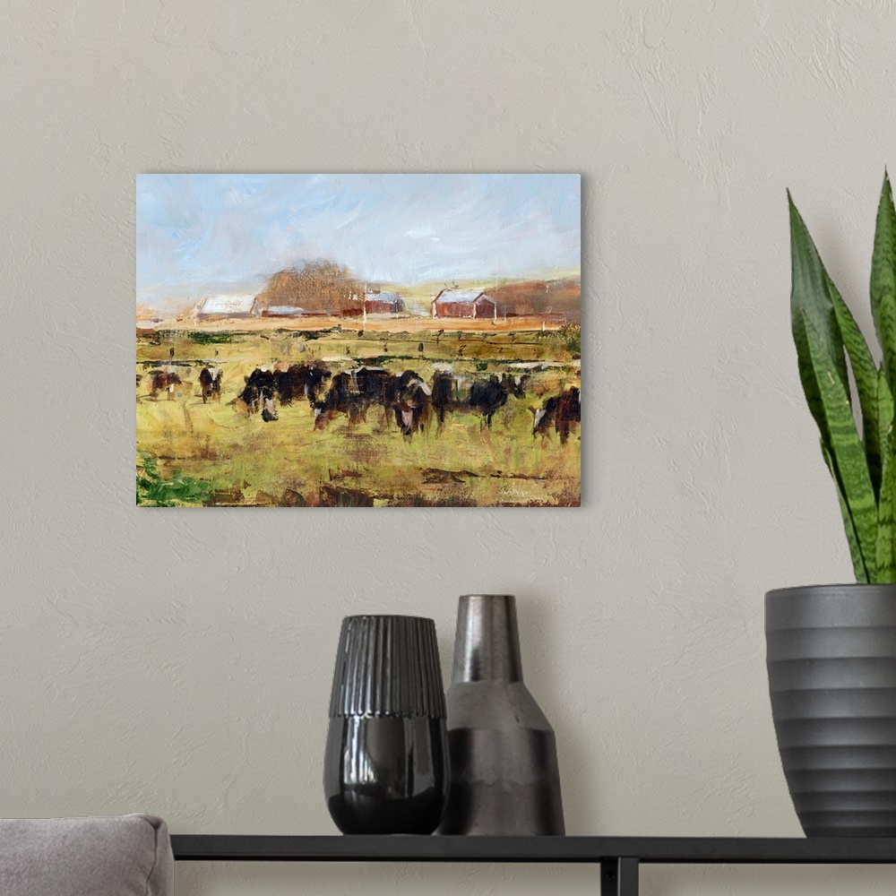 A modern room featuring Contemporary artwork of a herd of cattle grazing in a field near a barn.