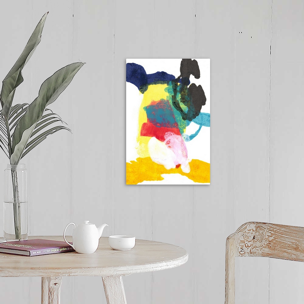 A farmhouse room featuring Vibrantly colored abstract artwork in primary colors.