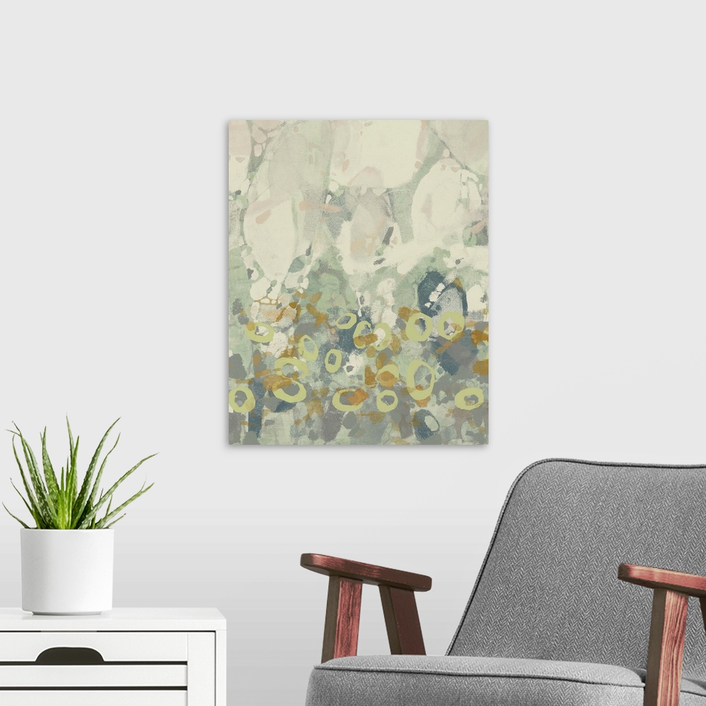 A modern room featuring Contemporary abstract painting using pale cool tones in organic shapes.