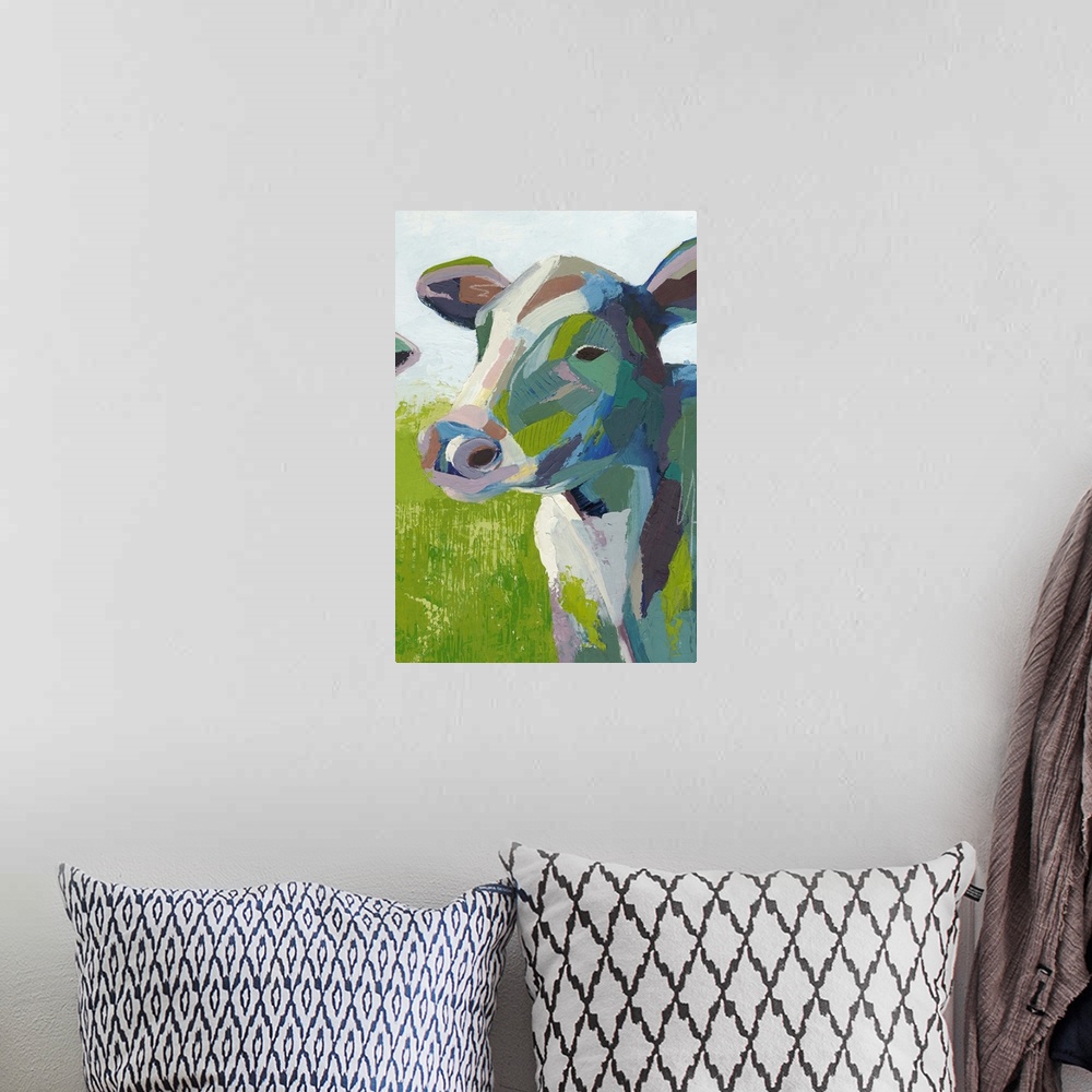 A bohemian room featuring Contemporary colorful painting of a cow in a field.