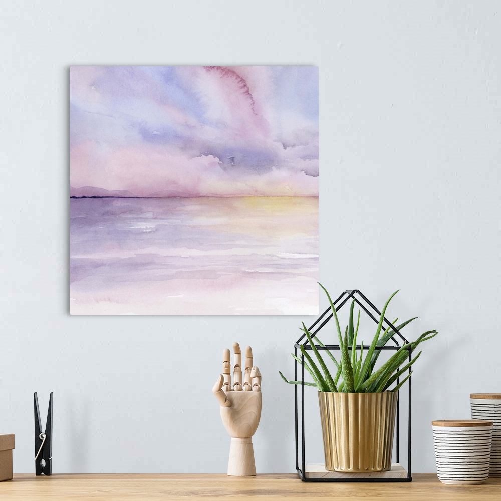 A bohemian room featuring Abstract landscape of a sun setting on the sea in pastel colors.