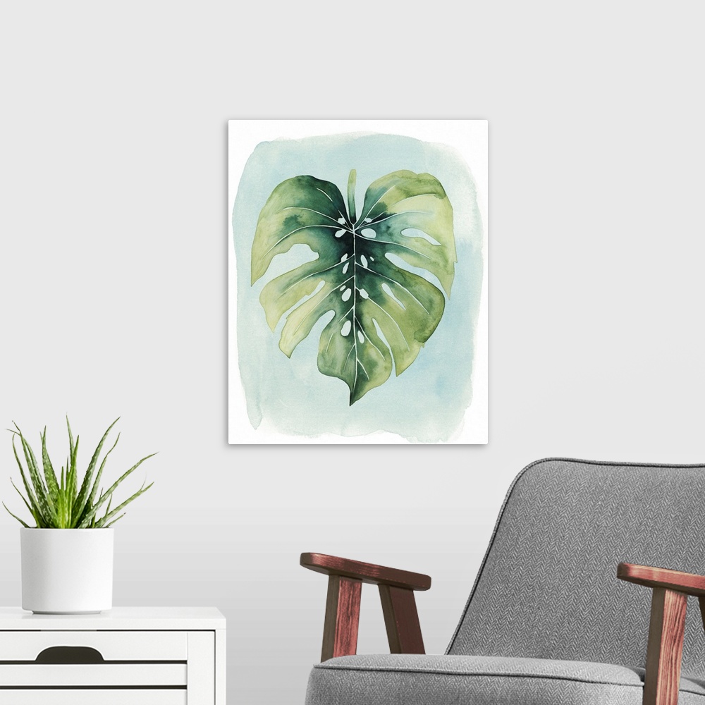 A modern room featuring Watercolor artwork of a broad green palm leaf on pale blue.