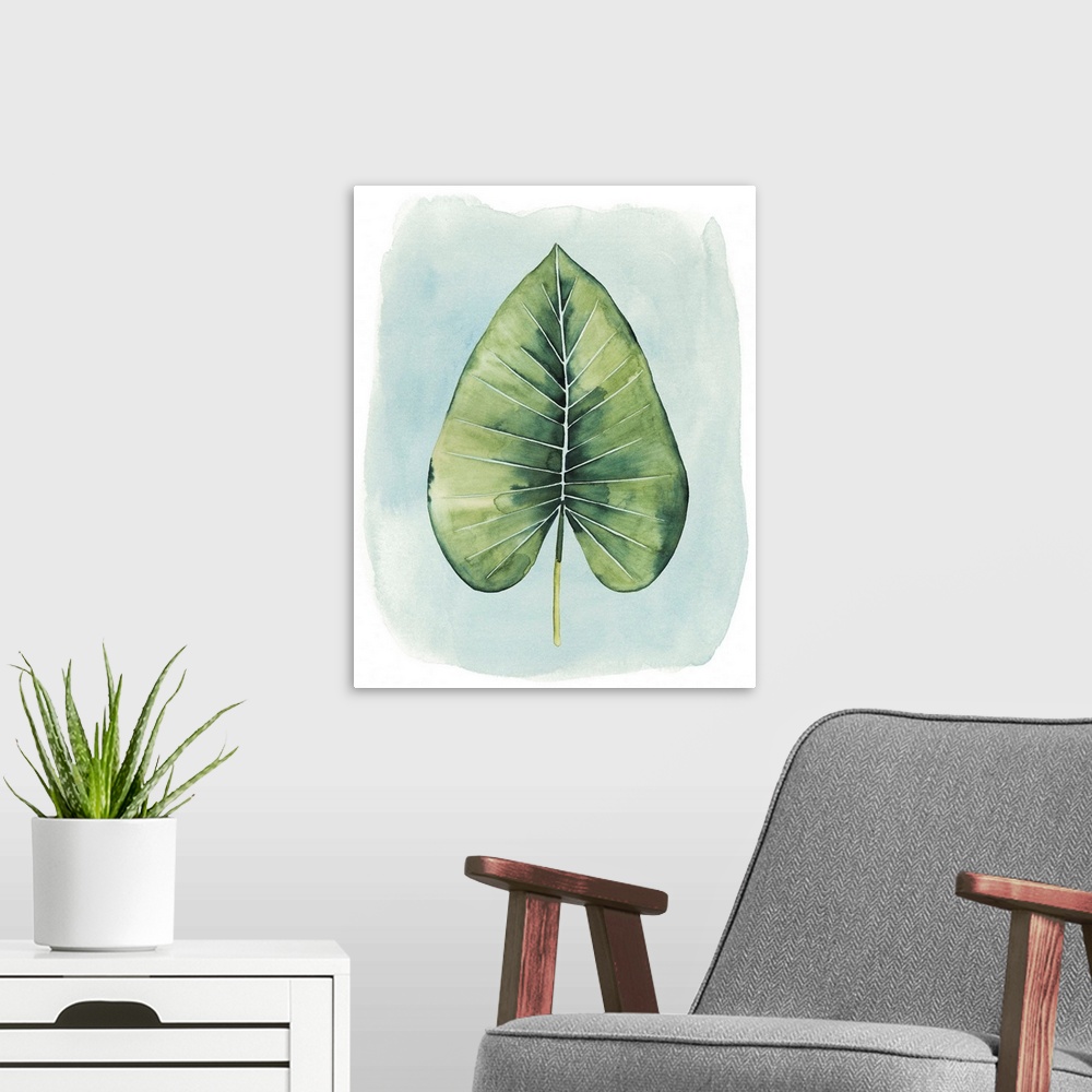 A modern room featuring Watercolor artwork of a broad green palm leaf on pale blue.