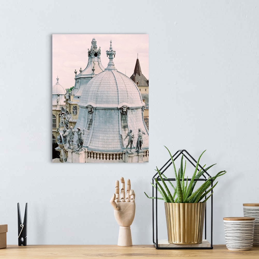 A bohemian room featuring A photograph showing the highly detailed architecture of a domed roof in Paris, France.