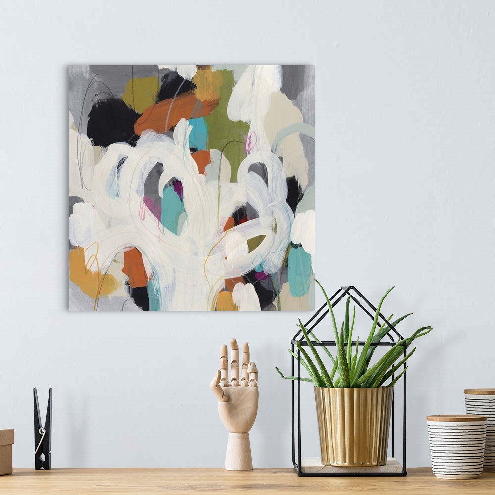 A bohemian room featuring Contemporary abstract painting of loopy paint strokes against a background colorful daubs of paint.