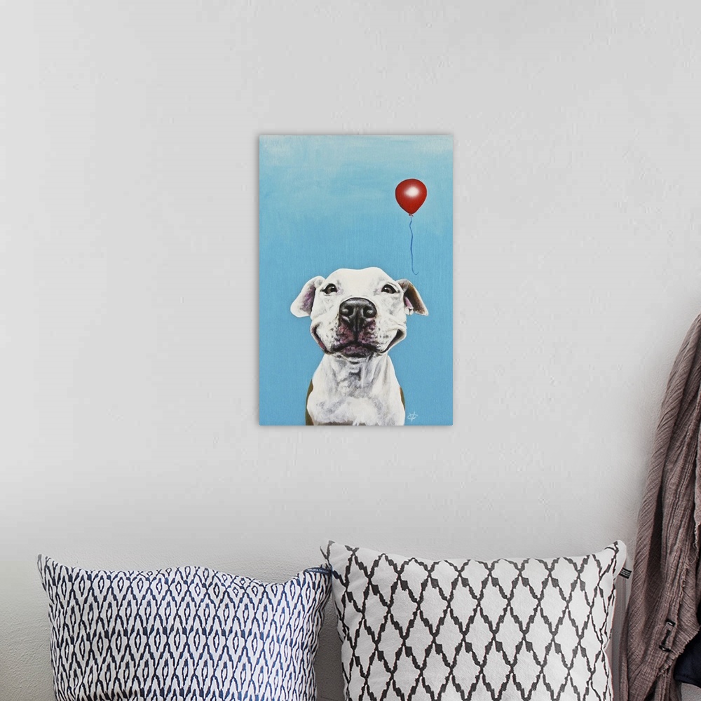 A bohemian room featuring Artwork of a white dog smiling with a red balloon, on a blue background.