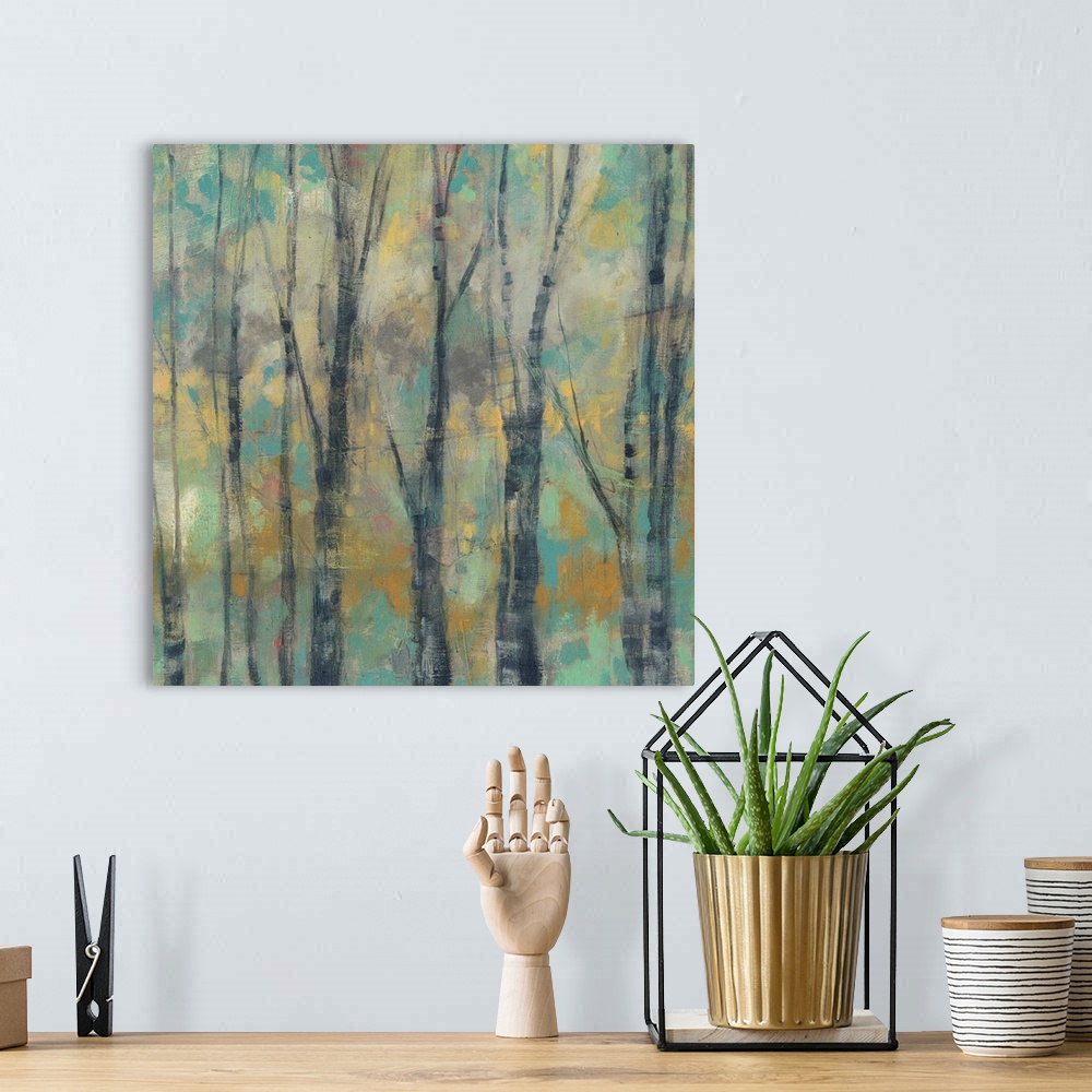 A bohemian room featuring Painting of a forest with thin trees against an abstract background.