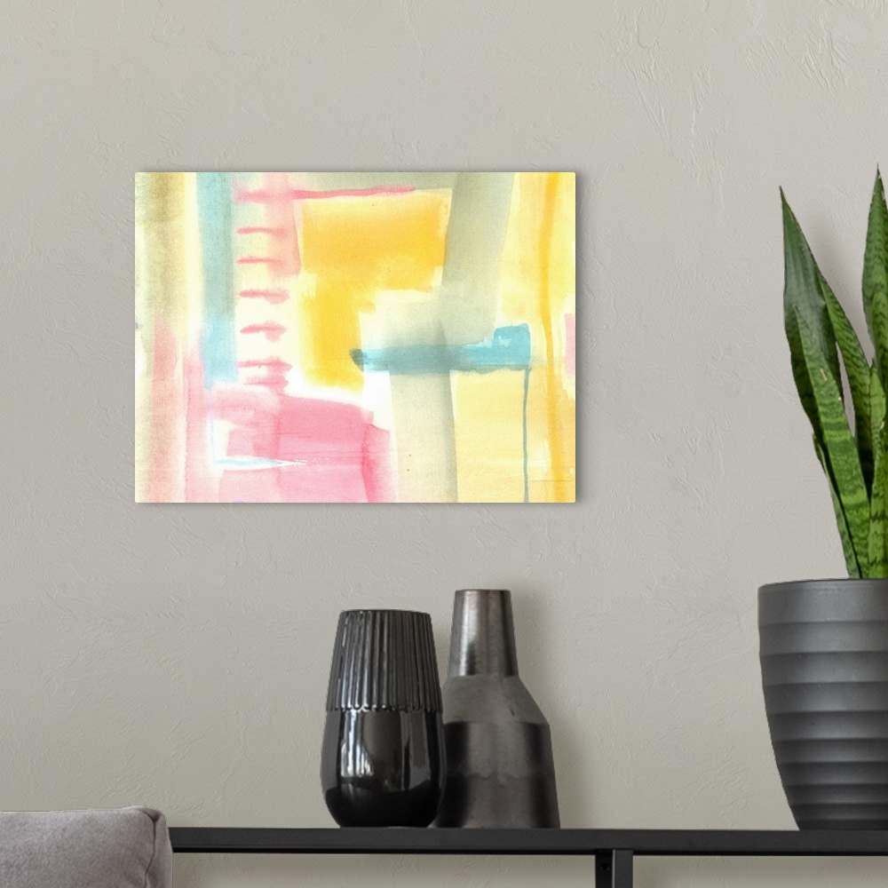 A modern room featuring Pastel abstract watercolor artwork in blended shapes of pink, grey, teal, and yellow.