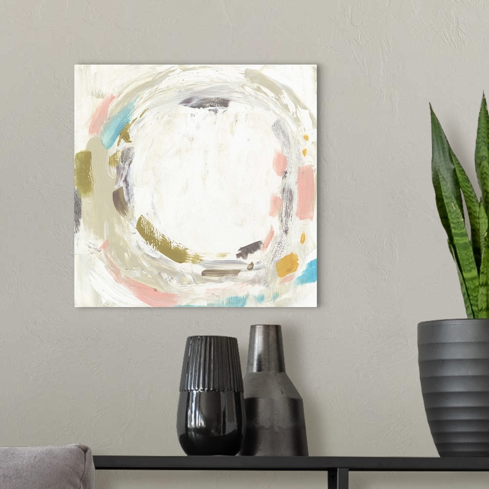 A modern room featuring Abstract painting of a circular shape of pastel pink, blue, and grey.