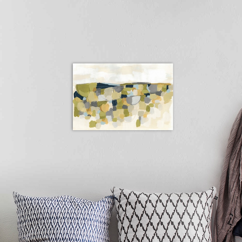 A bohemian room featuring This contemporary artwork features blocks of yellow, green and blue over a beige landscape.