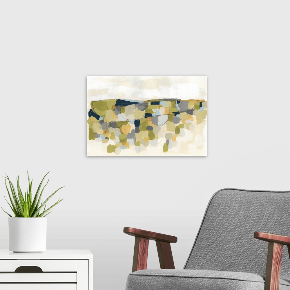 A modern room featuring This contemporary artwork features blocks of yellow, green and blue over a beige landscape.
