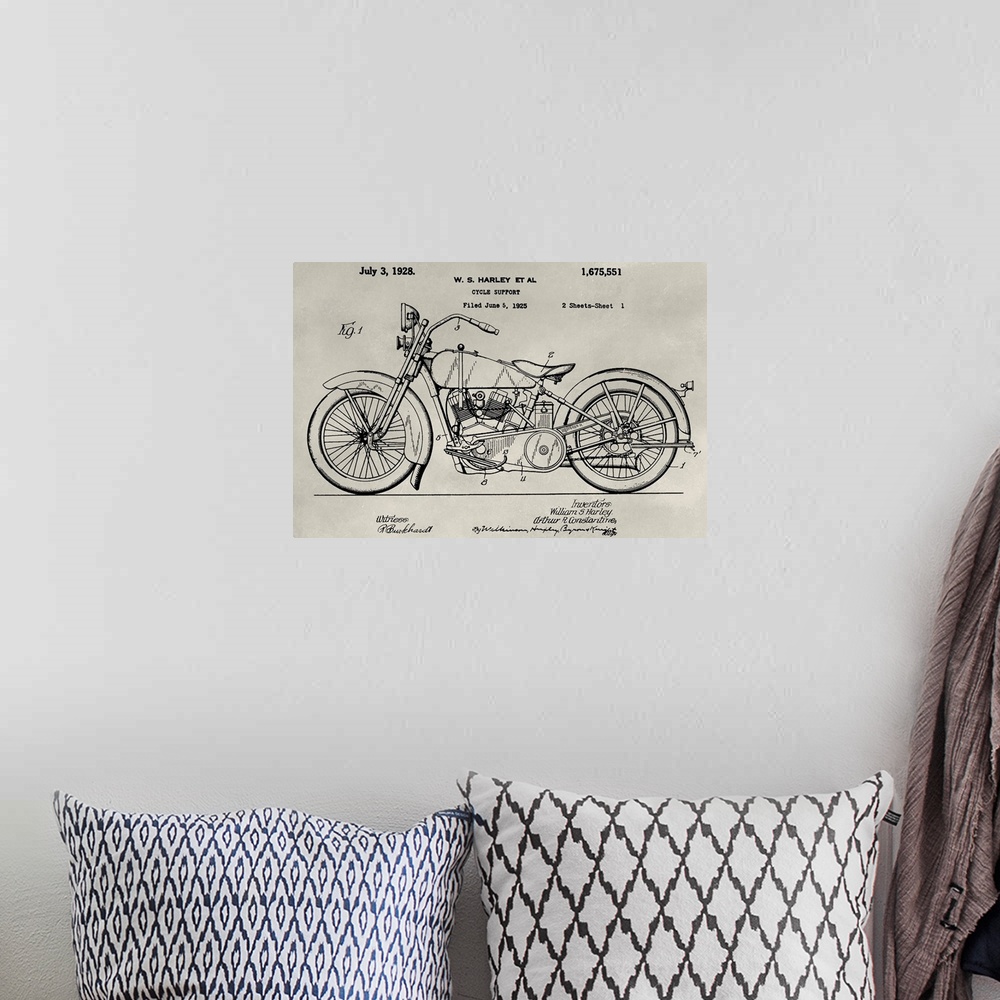 A bohemian room featuring Vintage patent illustration of a motorcycle.
