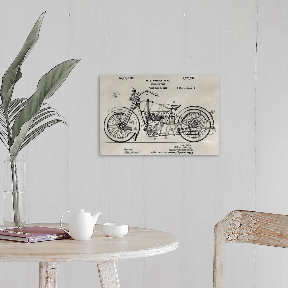 A farmhouse room featuring Vintage patent illustration of a motorcycle.