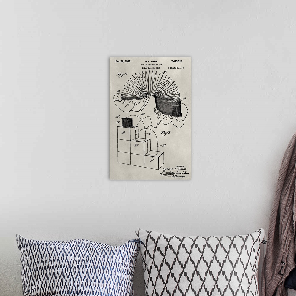 A bohemian room featuring Vintage patent illustration of a slinky.