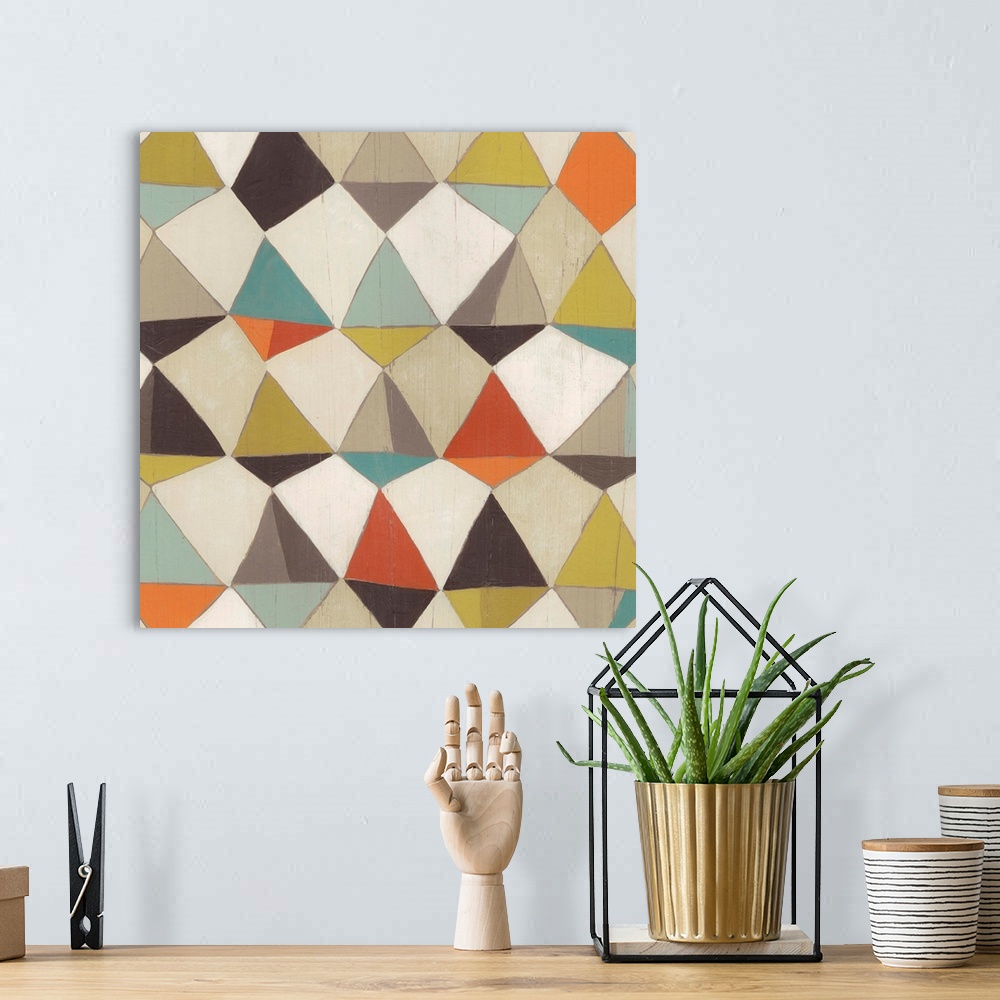 A bohemian room featuring Contemporary home decor art of a geometric pattern using muted colors.