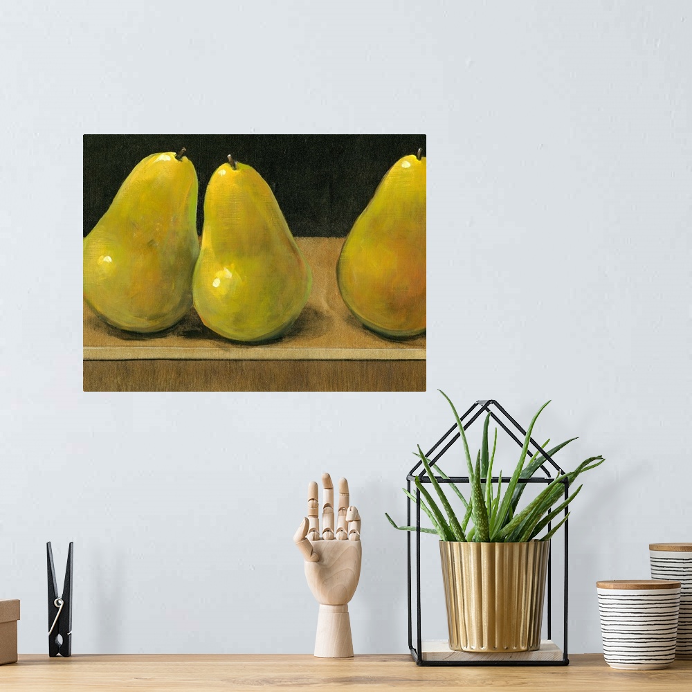 A bohemian room featuring Horizontal painting on a big canvas of three shining pears sitting on a flat surface, on a dark b...