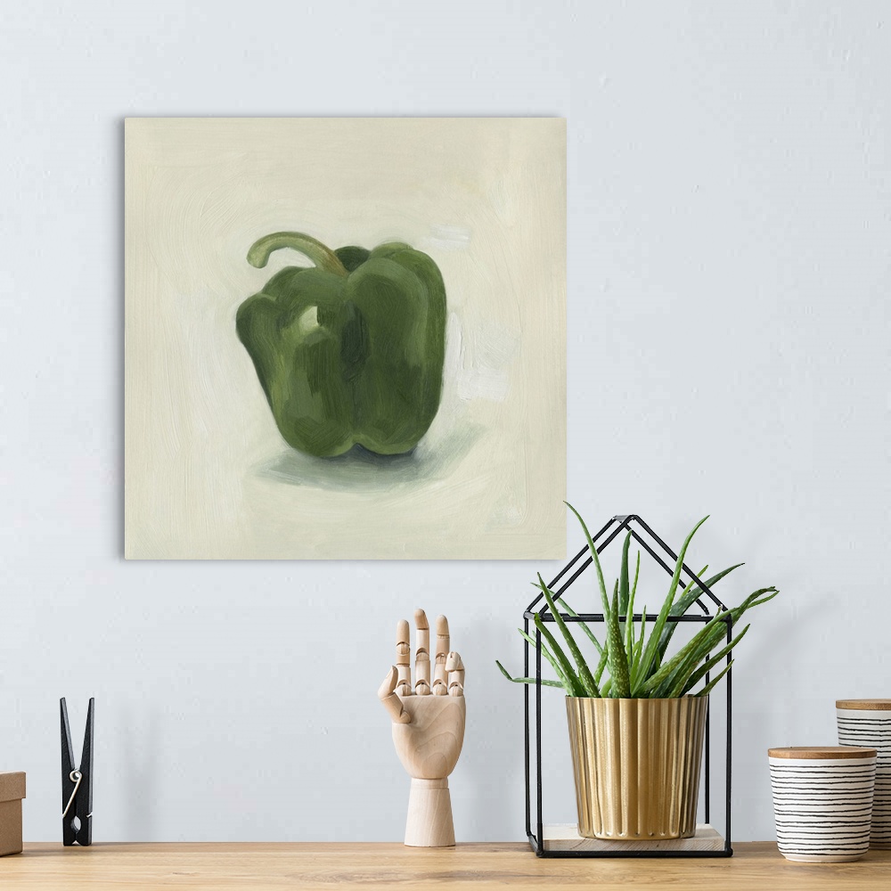 A bohemian room featuring A still life painting of a green bell pepper on a neutral backdrop.