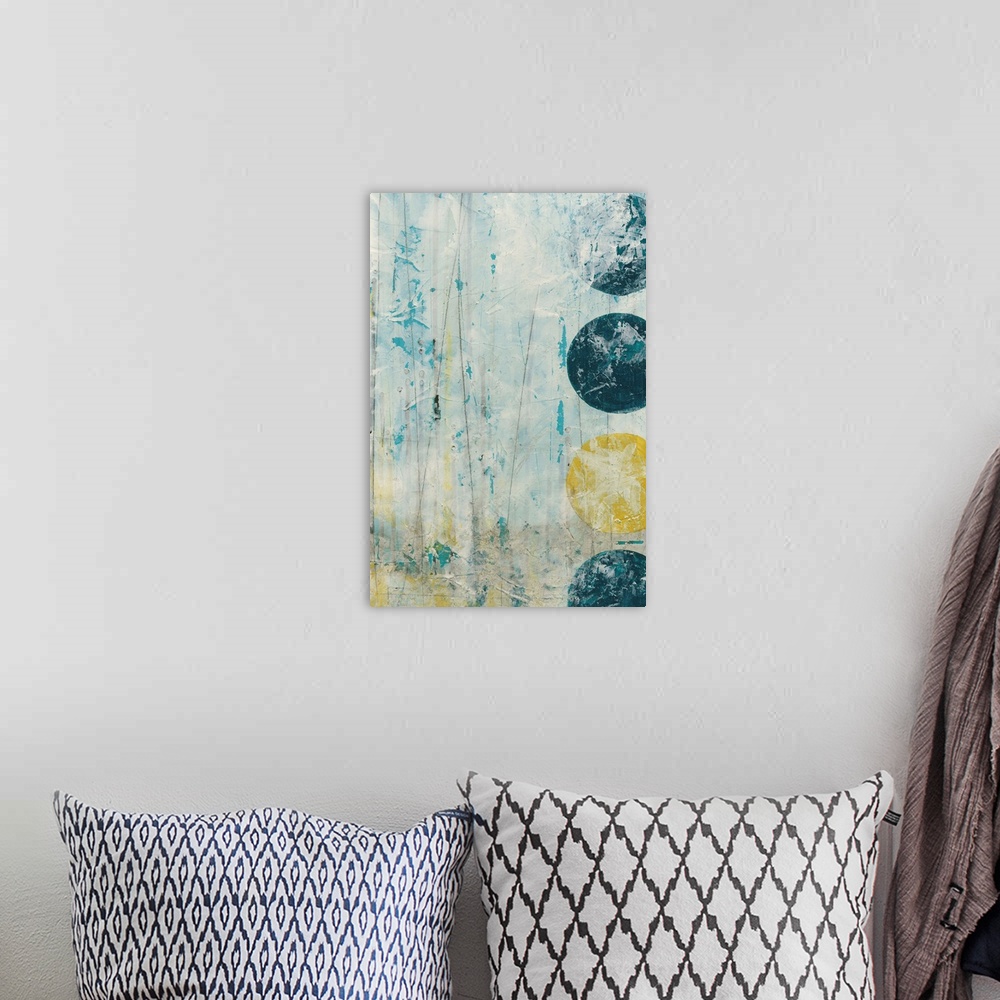 A bohemian room featuring Contemporary abstract painting using geometric shapes and weathered rustic colors.