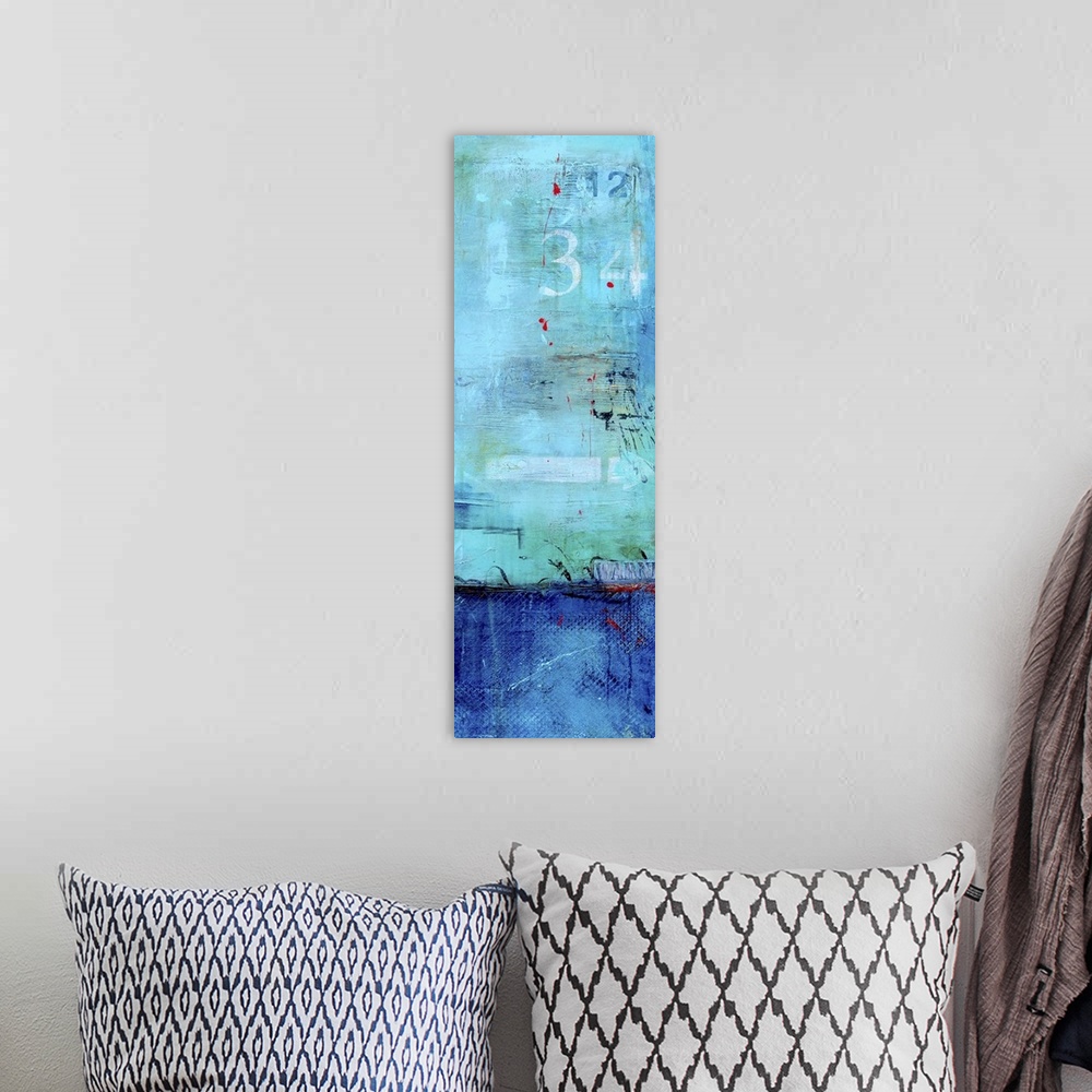 A bohemian room featuring Contemporary abstract painting using two vibrant blue tones contrasting one another with stencile...