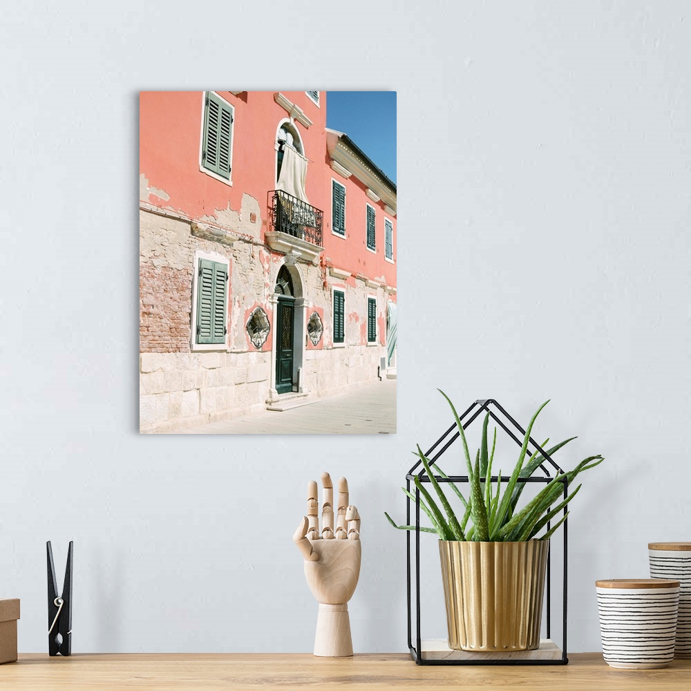 A bohemian room featuring Photograph of ornate doors and windows in old buildings, Burano, Italy.
