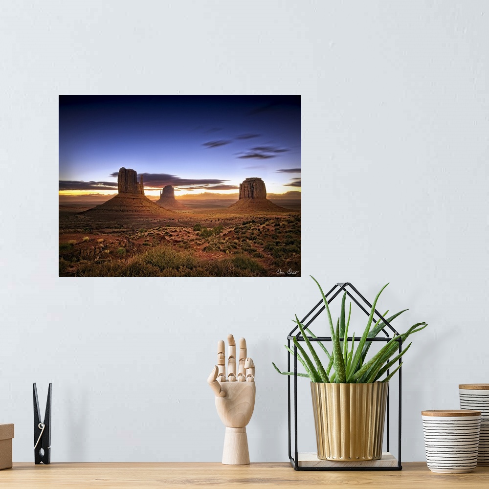 A bohemian room featuring Beautiful photograph of the canyons in Monument Valley, AZ at sunset.