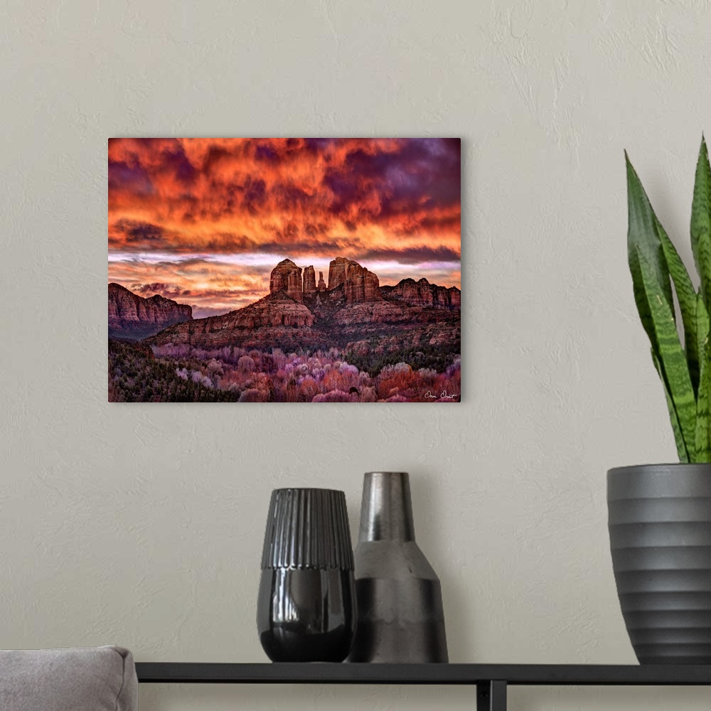 A modern room featuring High definition photograph of sandstone canyons with a fire sky above.