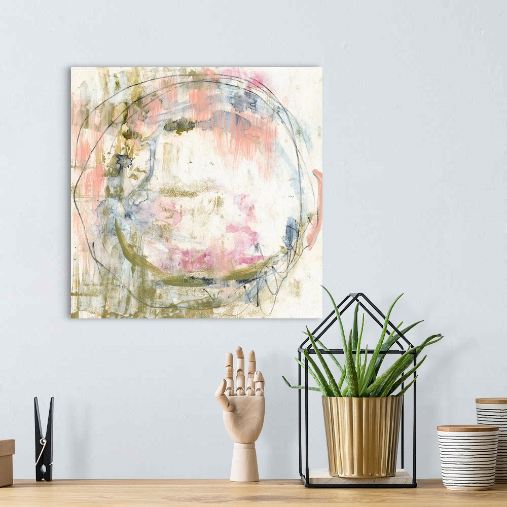 A bohemian room featuring Abstract artwork of mossy green and pale pink and blue in a round, organic shape.