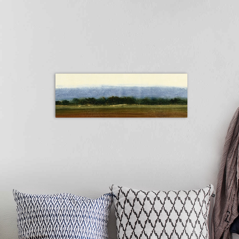 A bohemian room featuring Contemporary painting of an open field of farmland ready for planting.