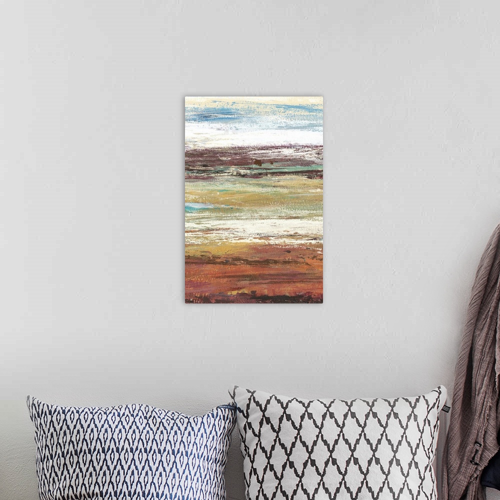 A bohemian room featuring Abstract artwork of horizontal bands of rust and beige, resembling a landscape.