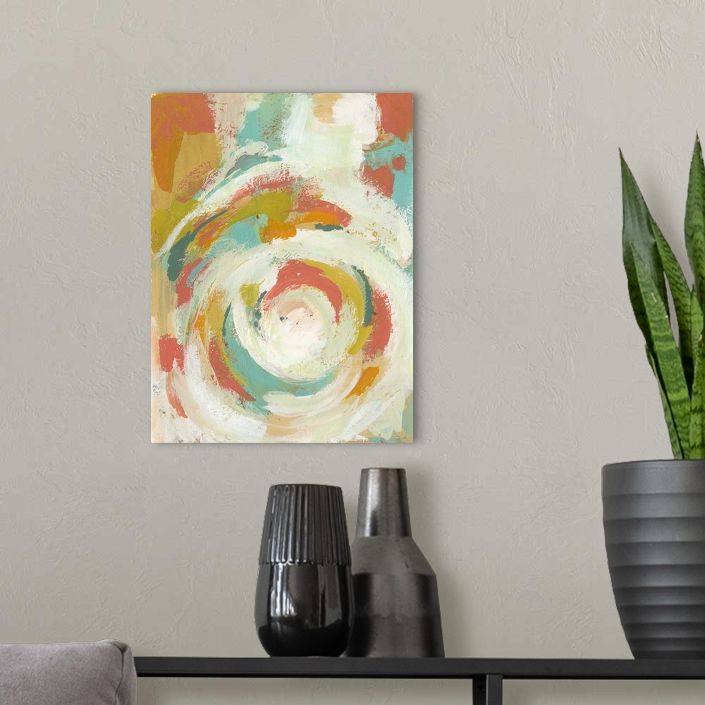 A modern room featuring Contemporary abstract painting of a swirling shape in white, orange, and green.