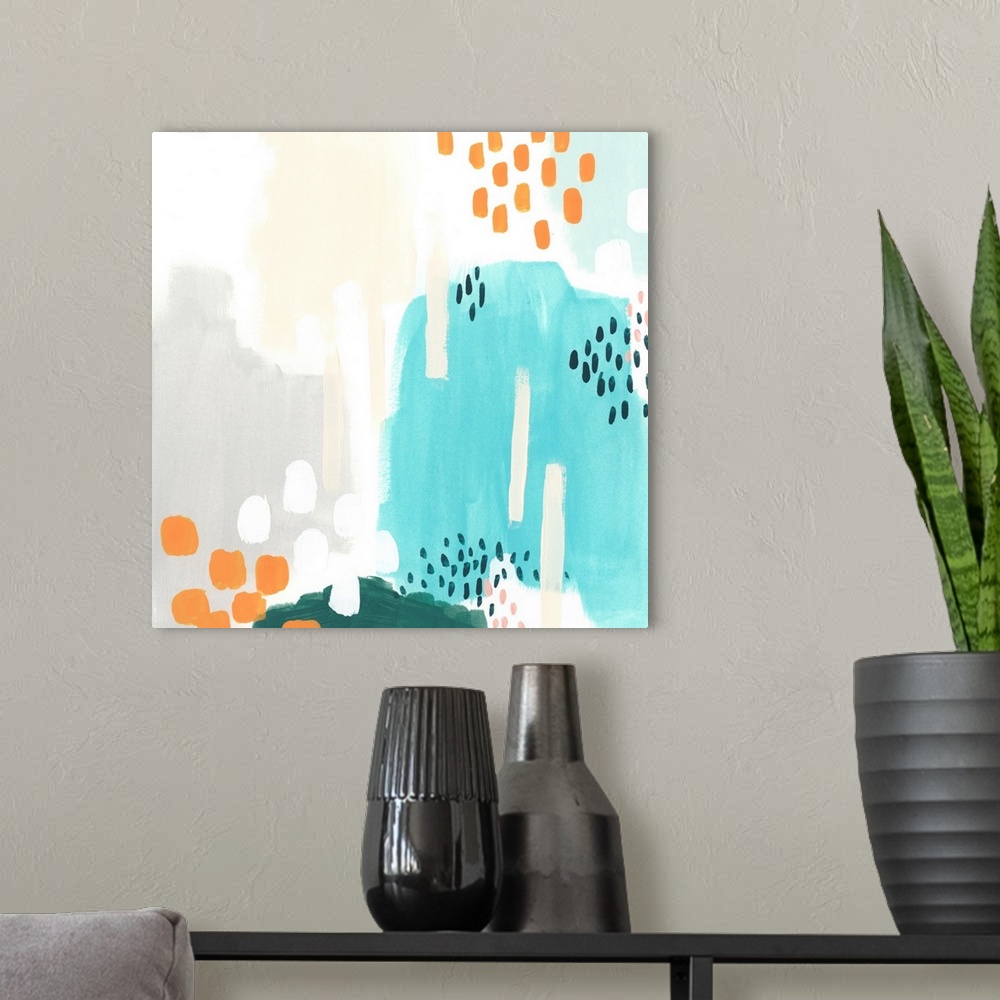 A modern room featuring Abstract artwork in mod shades of grey, orange, and teal, with dot and stripe motifs.